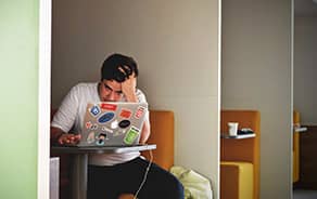 man-stressed-at-computer